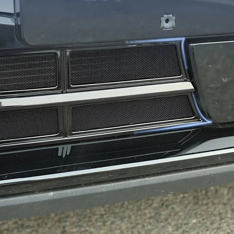 Black textured mesh grille guard for BYD vehicle protection, durable high-quality material.