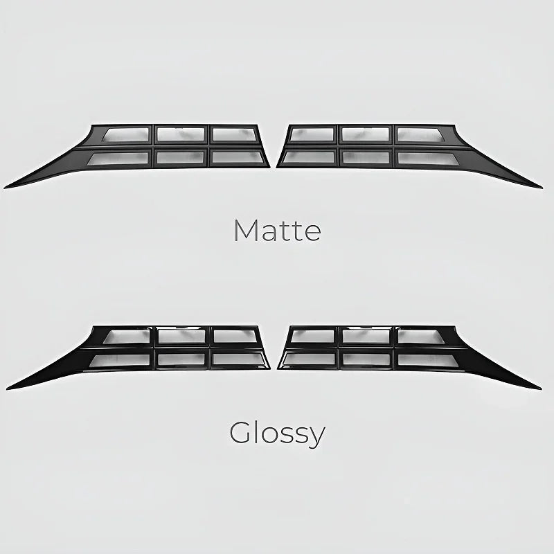 Black car interior trim pieces in matte and glossy finishes.