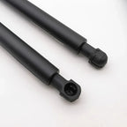 Pair of durable matte black automotive gas struts for car trunk or hood support