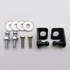 Set of black door hinge pins, silver metal washers, and bolts for automotive repair.