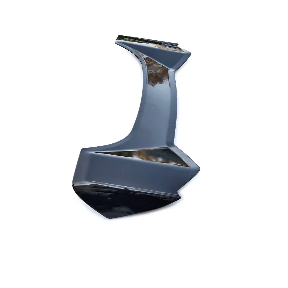 Glossy black aerodynamic car trim component with a sleek, polished finish.