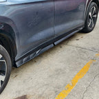 Black matte textured side skirt protector installed on a dark grey BYD vehicle for enhanced durability.