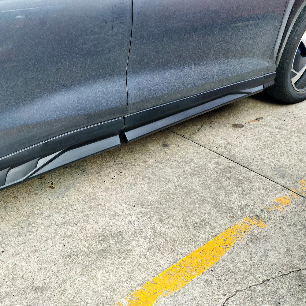 Black matte side skirt protector installed on a dark grey BYD vehicle body.