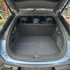 Premium black custom-fit carpet trunk mat for BYD, providing durable all-weather protection.