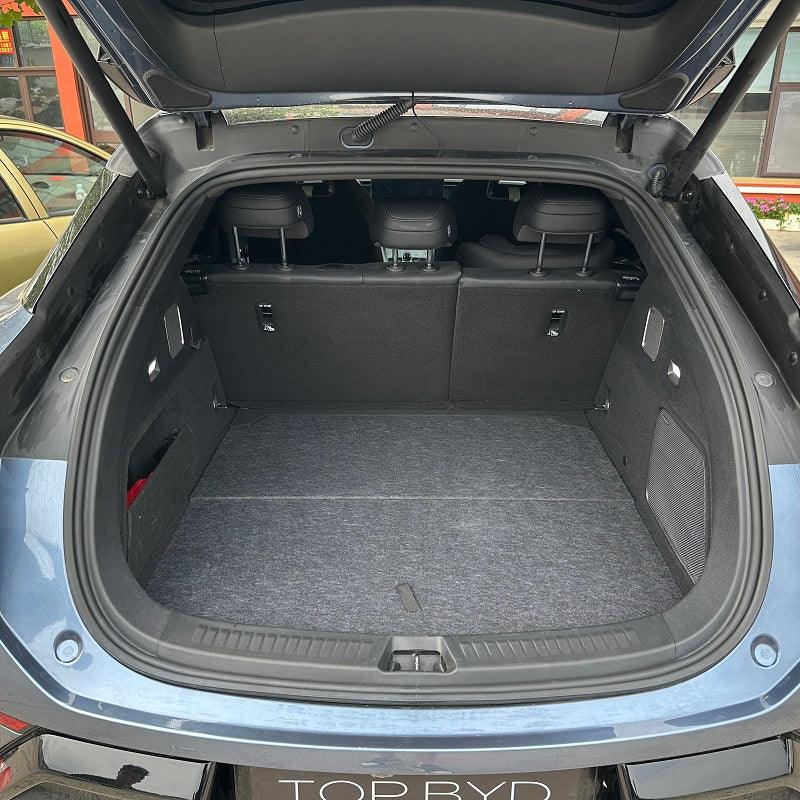 Premium black custom-fit carpet trunk mat for BYD, providing durable all-weather protection.
