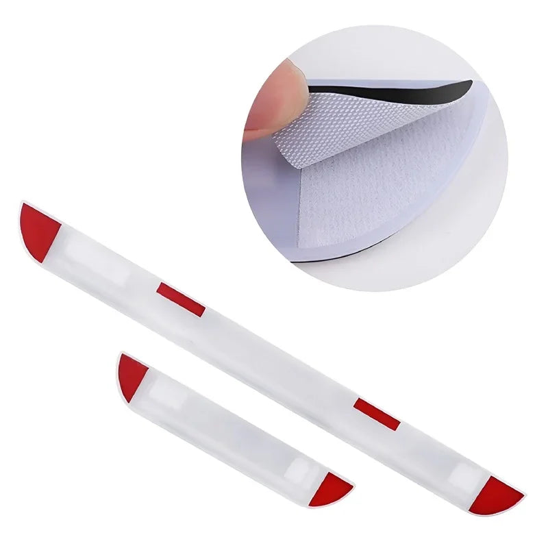 White adhesive car door sill protectors with red accents and a peel-and-stick backing.