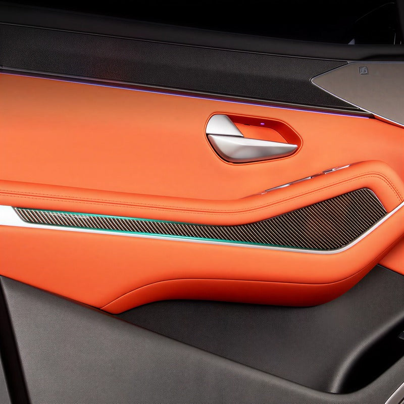 Luxury orange leather car door panel with carbon fiber accents and ambient lighting
