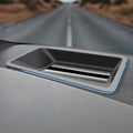 Black premium textured dashboard vent with sleek blue LED accent lighting.