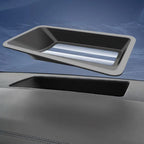 Black matte-finish durable storage tray for car dashboard compartment.