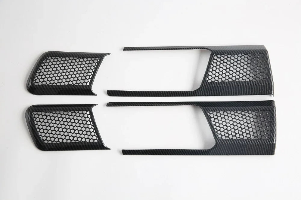 Pair of carbon fiber front grille inserts with black honeycomb mesh design