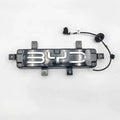 Black BYD illuminated emblem with chrome lettering and integrated wiring harness.