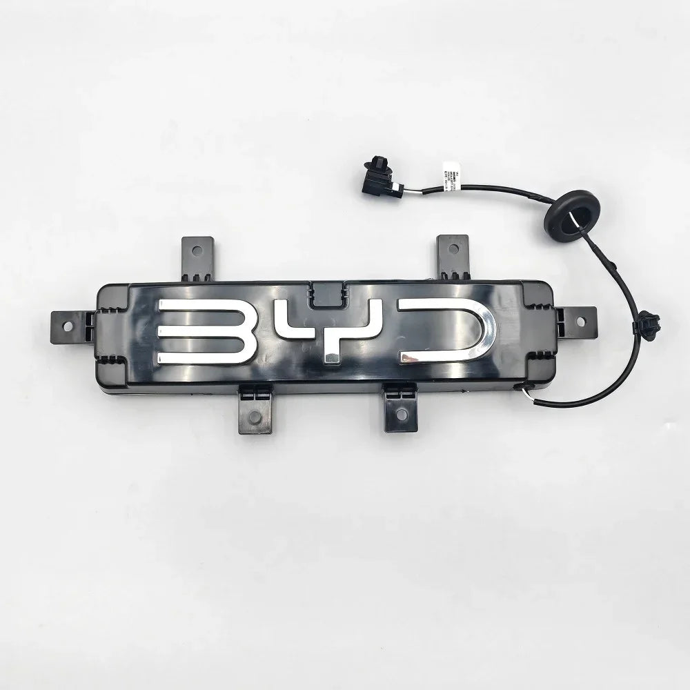 Black BYD illuminated emblem with chrome lettering and integrated wiring harness.