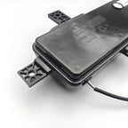 Black PC material automotive tail light housing with durable mounting brackets.