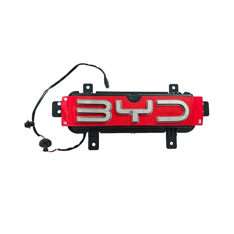 Red and black BYD emblem with chrome letters and electrical wiring for vehicle installation