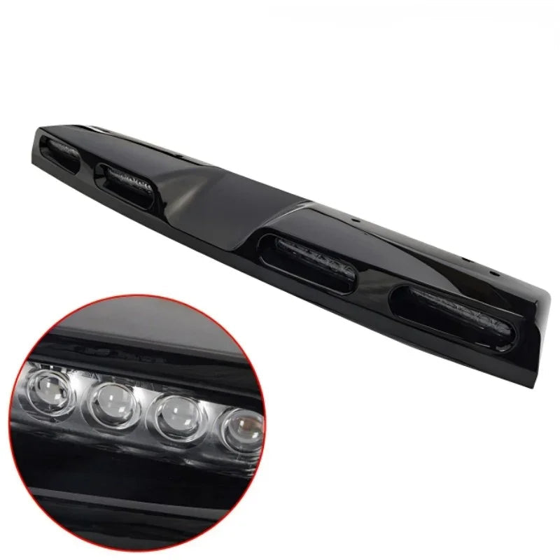 Glossy black LED bumper light bar with integrated clear lens LED modules.