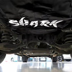 Black Shark protective underbody cover for car chassis, featuring durable fabric material.