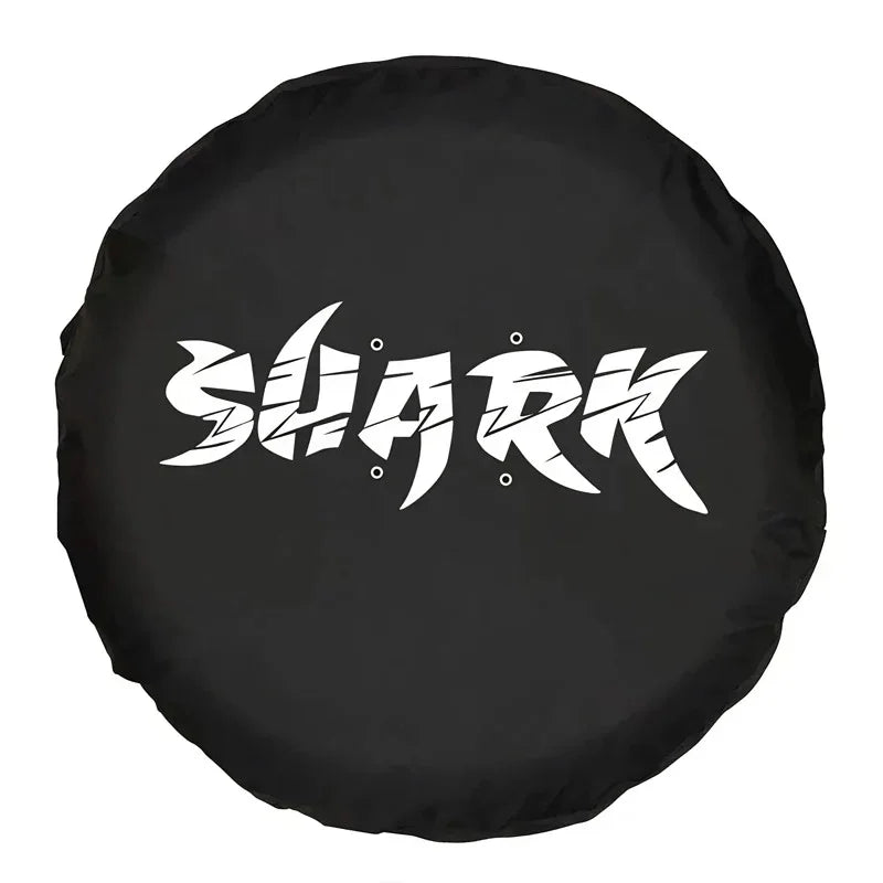 Black fabric spare tire cover featuring a bold white Shark graphic design.