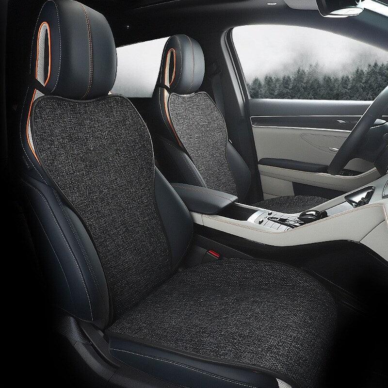 Premium black textured fabric car seat covers with orange accent stitching for BYD interior.