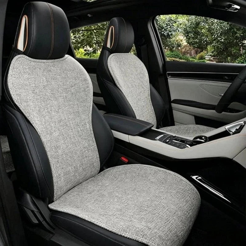 Professional grey textured fabric car seat covers with black accents for a modern interior.