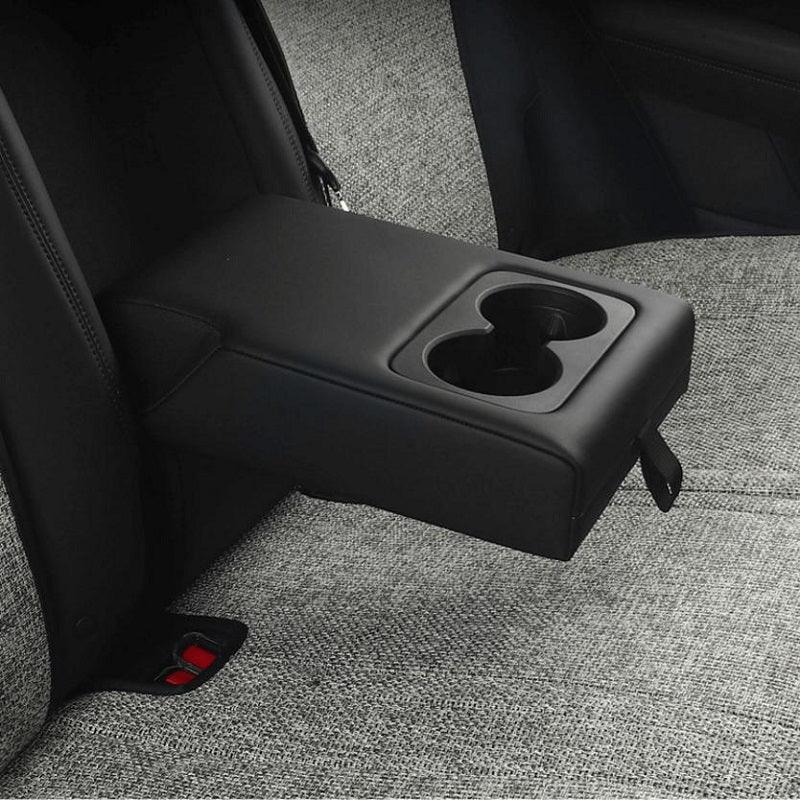 Black leather center armrest with dual cup holders for car interior