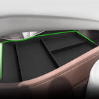 Black matte organizer tray for car center console, custom-fit for organized storage.