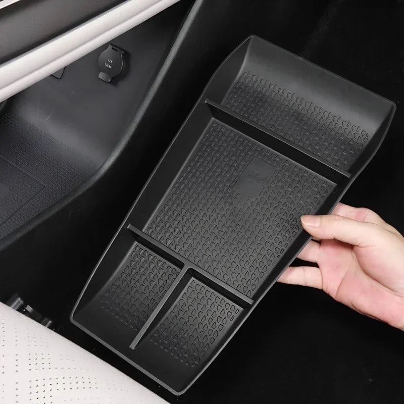 Black textured rubber car center console organizer tray with divider compartments