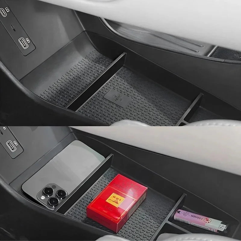 Black rubber center console organizer tray for BYD with anti-slip textured surface.