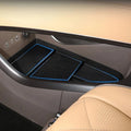 Black textured anti-slip center console organizer tray with blue trim for BYD interior.