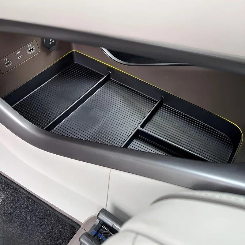 Black textured rubber car organizer tray for BYD interior storage compartment.