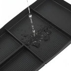 Waterproof black ribbed rubber car floor tray with liquid-resistant drainage design.