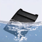 Waterproof black textured car tray accessory partially submerged in clear water.