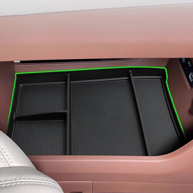 Black textured rubber car console organizer tray with vibrant green edge trim.