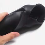 Matte black ergonomic silicone cup holder accessory for car interior protection.