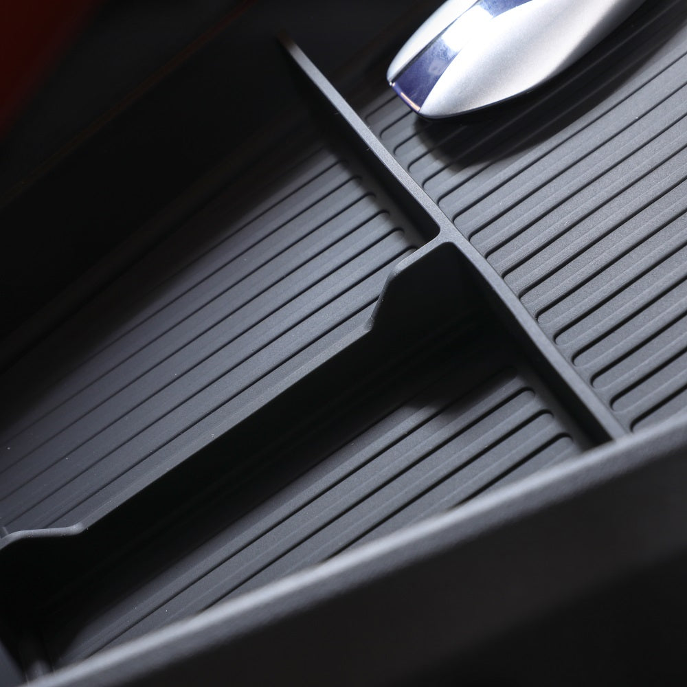 Black silicone non-slip center console organizer tray for BYD car interior storage.