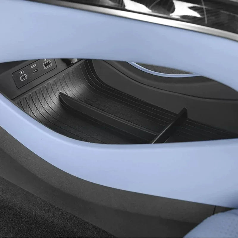 Black textured non-slip silicone organizer tray for BYD car center console storage.