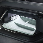 Grey silicone car center console organizer tray with non-slip texture in a BYD interior.