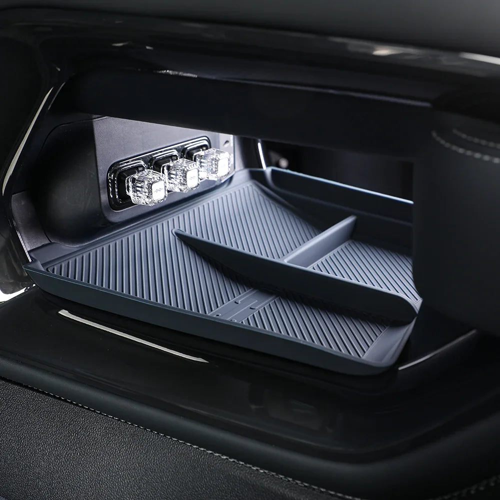 Custom-fit dark grey TPE car console tray with non-slip texture for BYD interior protection.