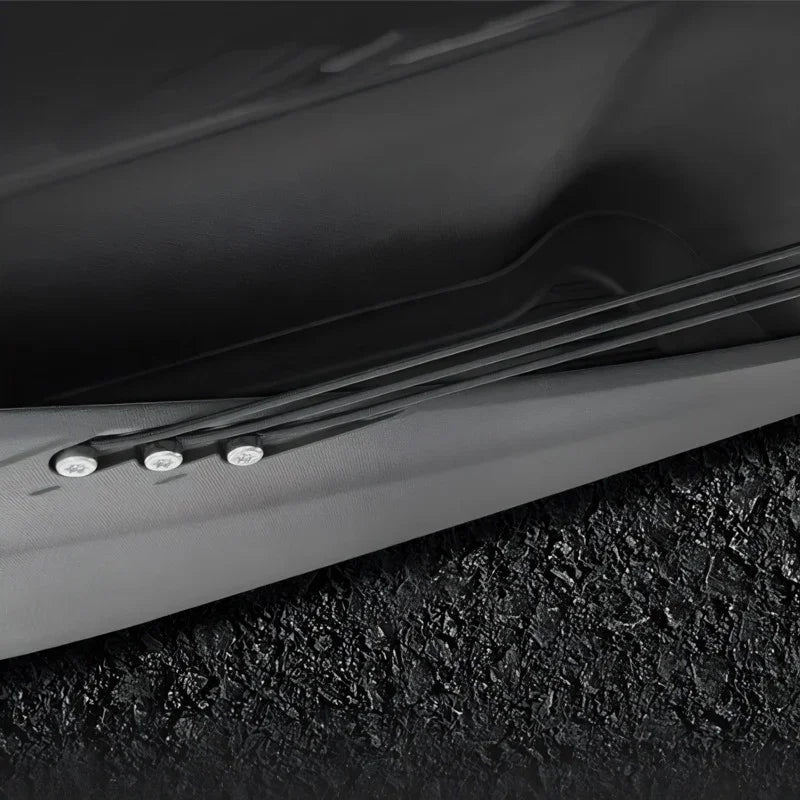 Black premium textured leather car interior trim with precision stitching and sleek finish.
