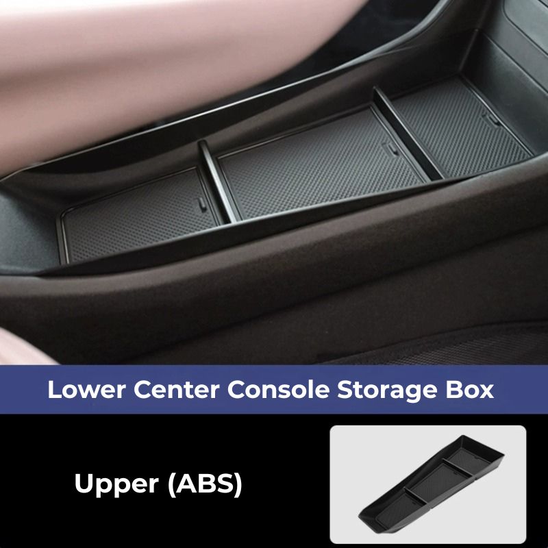 Black ABS material lower center console storage box with textured dividers for organized storage.