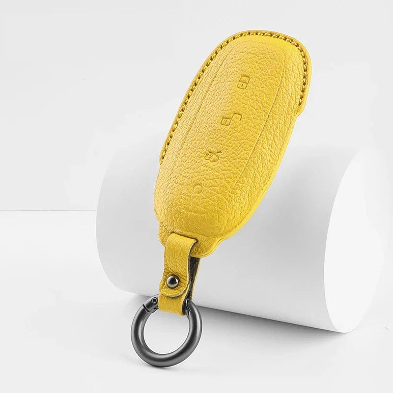Yellow pebbled leather car key fob cover with silver metal ring