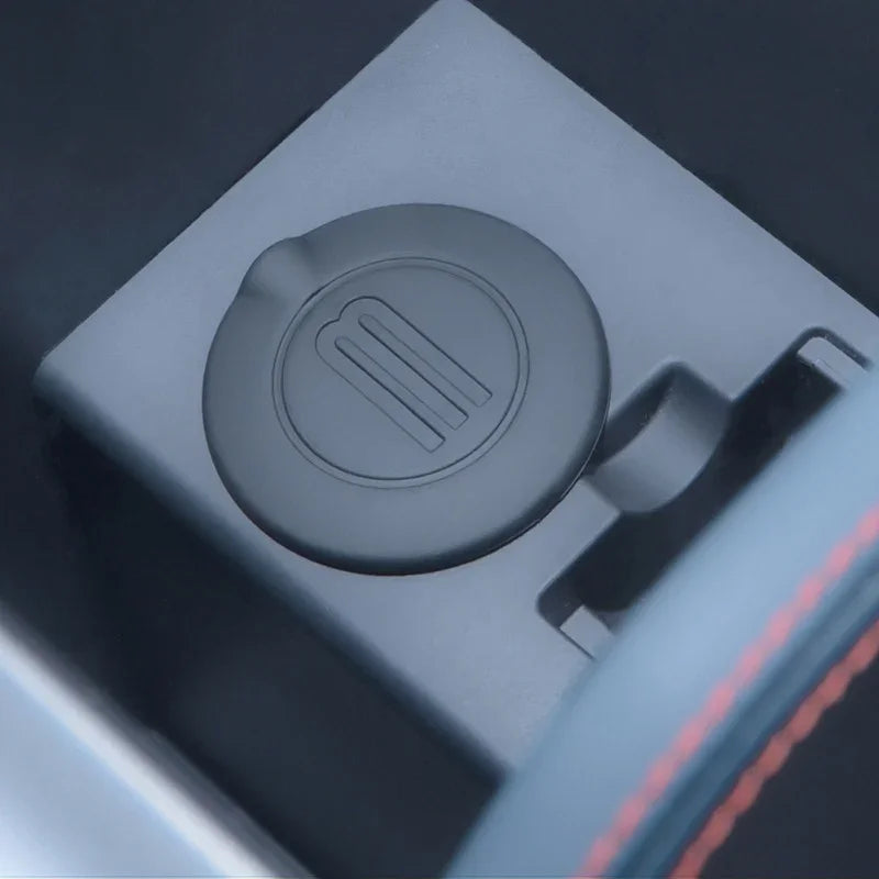 Matte black textured protective cover for BYD vehicle interior components.