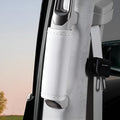 White leather seatbelt cover protecting the pillar in a vehicle interior.