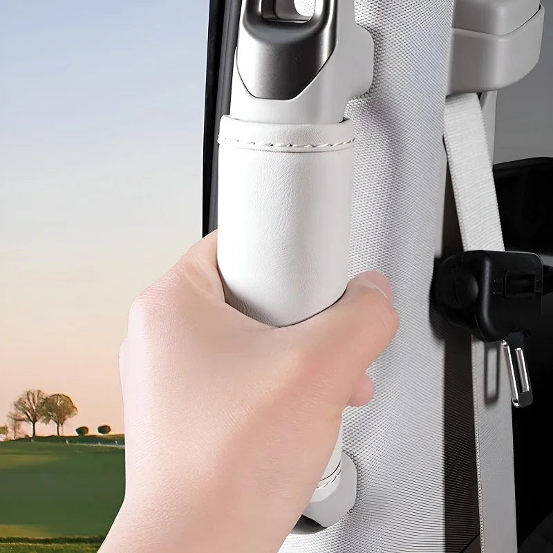 White faux leather car door grab handle cover for enhanced grip and protection.
