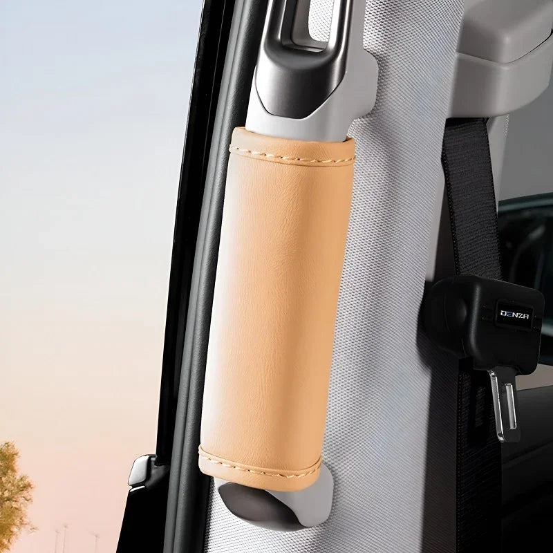Tan leather seatbelt pillar cover for BYD car interior protection.