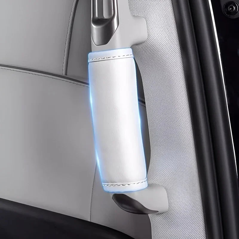 White leather door handle protector with precision stitching for car interiors.