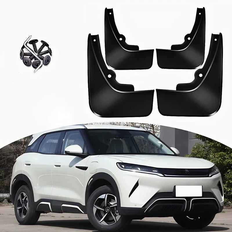 Set of four durable black plastic mud guards with mounting hardware for a white BYD SUV.