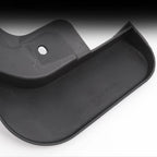 Durable black plastic automotive floor mat accessory with precise molding and textured finish.