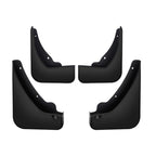 Set of four durable black plastic car mud flaps for vehicle protection.
