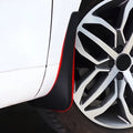 Black durable rubber mud flap installed on a white car wheel arch for protection.