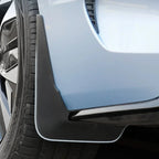 Black durable rubber mud flap installed on a light blue BYD car to protect against wear and tear.